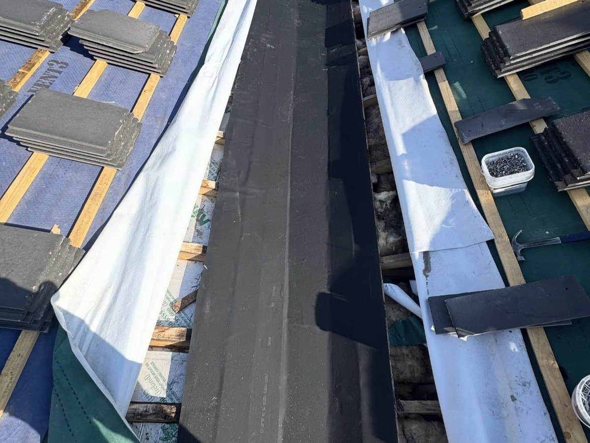 Roof valley being re-laid by BMS Vanguard Roofing