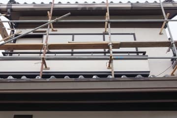 Scaffolding up for roof remedial work on a house