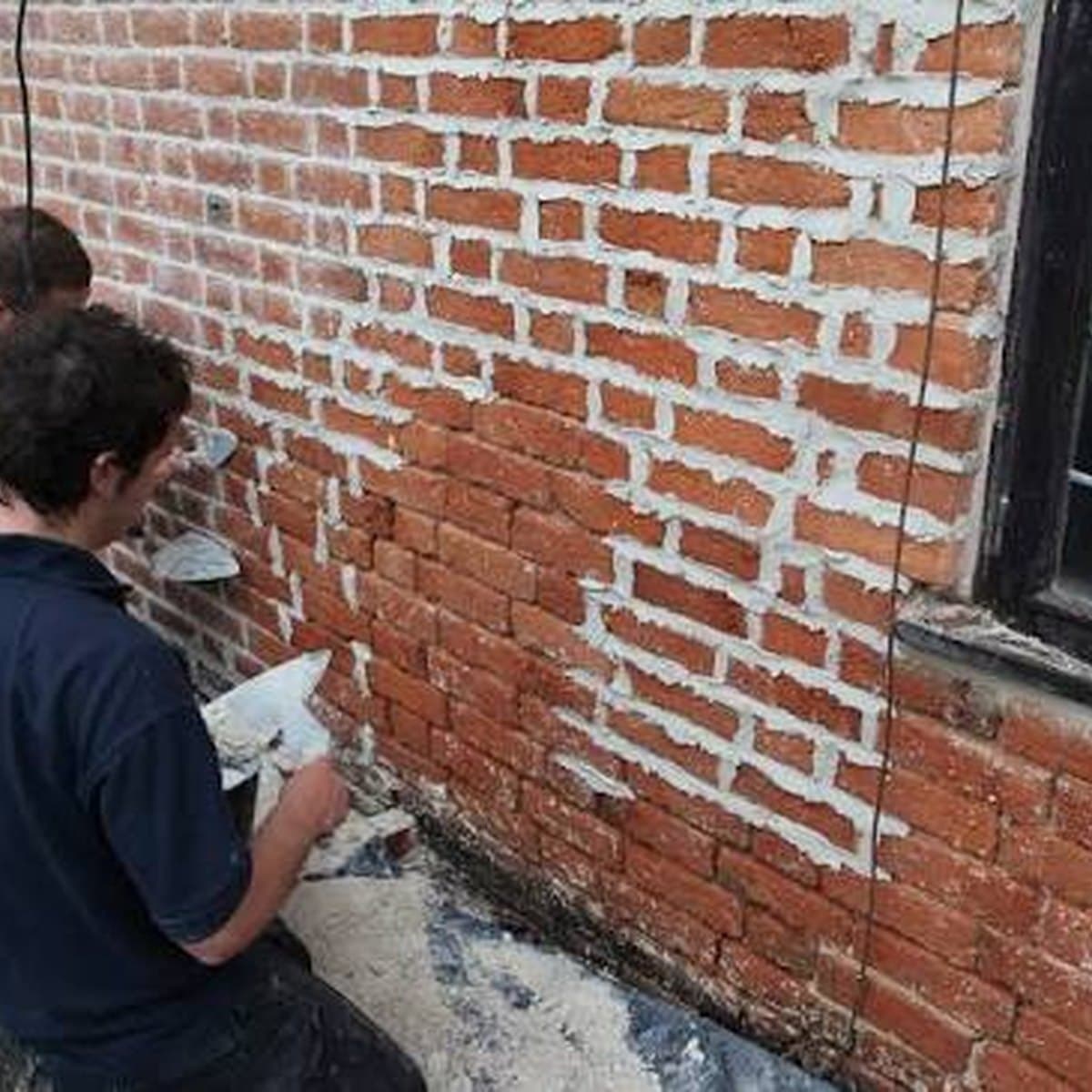 Brickwork being re-pointed